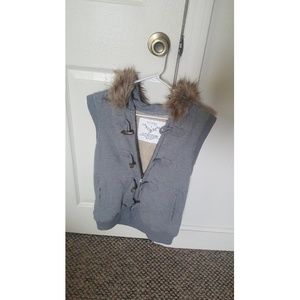 Fleece lined vest with fur